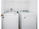Convenient laundry room with washer and dryer at 2362 Lancashire St, Davenport, FL 33896