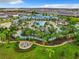 Community pool area with expansive deck and landscaping at 4190 Lana Ave, Davenport, FL 33897