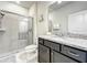 Bathroom with a walk-in shower and granite countertops at 4190 Lana Ave, Davenport, FL 33897