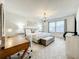 Main bedroom with king-size bed and stylish decor at 4190 Lana Ave, Davenport, FL 33897