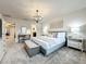 Main bedroom with a king-size bed and workspace at 4190 Lana Ave, Davenport, FL 33897