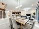 Open concept dining room with a view of the living room and kitchen at 4190 Lana Ave, Davenport, FL 33897