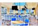 Outdoor bar with blue and white tile and seating at 4190 Lana Ave, Davenport, FL 33897