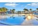 Large resort-style pool with plenty of lounge chairs at 4190 Lana Ave, Davenport, FL 33897