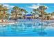 Stunning pool area with a view of the pool and palm trees at 4190 Lana Ave, Davenport, FL 33897
