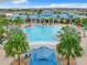 Expansive resort pool with surrounding lounge areas at 4190 Lana Ave, Davenport, FL 33897