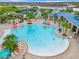 Large resort-style pool with plenty of lounge chairs at 4190 Lana Ave, Davenport, FL 33897