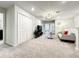 Spacious upstairs game room with TV and comfortable seating at 4190 Lana Ave, Davenport, FL 33897