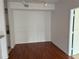 Empty dining area with hardwood flooring at 5542 Metrowest Blvd # 206, Orlando, FL 32811