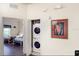 Laundry area with stacked washer and dryer and a glimpse of a bedroom at 605 Rum Run # 605, Davenport, FL 33837