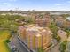 Aerial view of a residential building with a city skyline in the background at 7500 Toscana Blvd # 333, Orlando, FL 32819