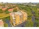 An aerial shot of a condo building, highlighting its architecture and setting at 7500 Toscana Blvd # 333, Orlando, FL 32819