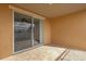 Private balcony with sliding glass doors and tile flooring at 7500 Toscana Blvd # 333, Orlando, FL 32819