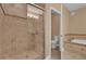 Bathroom with walk-in shower and toilet at 7500 Toscana Blvd # 333, Orlando, FL 32819