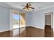 Spacious bedroom with hardwood floors and private balcony at 7500 Toscana Blvd # 333, Orlando, FL 32819
