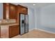 Kitchen with stainless steel appliances and wood cabinets at 7500 Toscana Blvd # 333, Orlando, FL 32819
