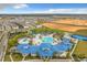 Aerial view of community resort pool and amenities at 826 Paradise Dr, Davenport, FL 33897