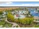 Aerial view of community pool and surrounding amenities at 826 Paradise Dr, Davenport, FL 33897