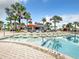 Inviting pool area with lounge chairs and swim-up bar at 826 Paradise Dr, Davenport, FL 33897