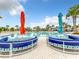 Large resort-style pool with lounge seating at 826 Paradise Dr, Davenport, FL 33897