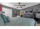 Dramatic main bedroom with a Hollywood theme, king-size bed, and unique wall art at 1528 Mulligan Blvd, Davenport, FL 33896