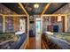 Wizard-themed bedroom with two beds, built-in dresser, and ensuite bathroom access at 1528 Mulligan Blvd, Davenport, FL 33896