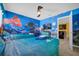 ' bedroom with Finding Nemo theme, two twin beds, and a ceiling fan at 1528 Mulligan Blvd, Davenport, FL 33896