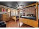 Harry Potter themed bedroom with two four-poster beds and dark wood furnishings at 1528 Mulligan Blvd, Davenport, FL 33896