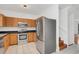 Updated kitchen featuring stainless steel appliances and wood cabinets at 234 N Glenwood Ave # 4, Orlando, FL 32803