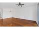 Bright living room with gleaming wood floors and modern light fixture at 234 N Glenwood Ave # 4, Orlando, FL 32803