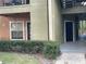 Well-maintained building exterior with landscaping at 6029 Westgate Dr # 714, Orlando, FL 32835