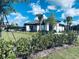 Community clubhouse surrounded by lush landscaping at 15271 Willow Arbor Cir, Orlando, FL 32824