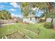 Spacious backyard with a garden and plenty of space for recreation at 1550 Indiana Ave, Winter Park, FL 32789