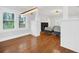 Bright dining area with hardwood floors and view to living room at 1550 Indiana Ave, Winter Park, FL 32789