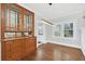 Charming dining room with hardwood floors and built-in hutch at 1550 Indiana Ave, Winter Park, FL 32789