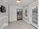 Kitchen features stainless steel refrigerator and backyard access at 1550 Indiana Ave, Winter Park, FL 32789