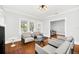 Spacious living room with hardwood floors and comfortable seating at 1550 Indiana Ave, Winter Park, FL 32789