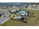 Community pool, playground, and clubhouse surrounded by homes and green space at 2075 Heart Lake Dr, Groveland, FL 34736