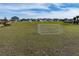 Community park with soccer goals and homes in the background at 2075 Heart Lake Dr, Groveland, FL 34736