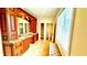Elegant bathroom with double vanity, granite counters, and a separate shower and toilet at 2904 S Peninsula Dr, Daytona Beach Shores, FL 32118