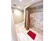 Clean bathroom with a shower/tub combo and tile flooring at 2904 S Peninsula Dr, Daytona Beach Shores, FL 32118
