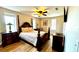 Bright bedroom featuring a king-size bed, wood floors, and ample natural light at 2904 S Peninsula Dr, Daytona Beach Shores, FL 32118