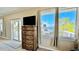 Main bedroom with water views and private balcony at 2904 S Peninsula Dr, Daytona Beach Shores, FL 32118