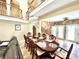 Elegant dining room with a large table and access to backyard at 2904 S Peninsula Dr, Daytona Beach Shores, FL 32118