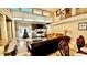 Spacious living room with stone fireplace and high ceilings at 2904 S Peninsula Dr, Daytona Beach Shores, FL 32118