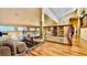 Open loft area with wood flooring and a comfortable sitting area at 2904 S Peninsula Dr, Daytona Beach Shores, FL 32118