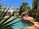 Inviting pool area with a waterfall feature at 2904 S Peninsula Dr, Daytona Beach Shores, FL 32118