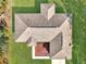 Close-up aerial view of the roof and back patio, showcasing the architectural details at 3891 Sw 130Th Loop, Ocala, FL 34473