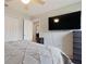Large main bedroom with ample space, walk-in closet access, and a ceiling fan at 5761 Woodruff Way, Lakeland, FL 33812