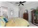 Spacious bedroom with ensuite access, charming decor and ample storage at 6535 Shimmering Shores Ln, Saint Cloud, FL 34771